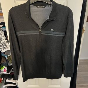 TravisMathew three quarter zip pull over.